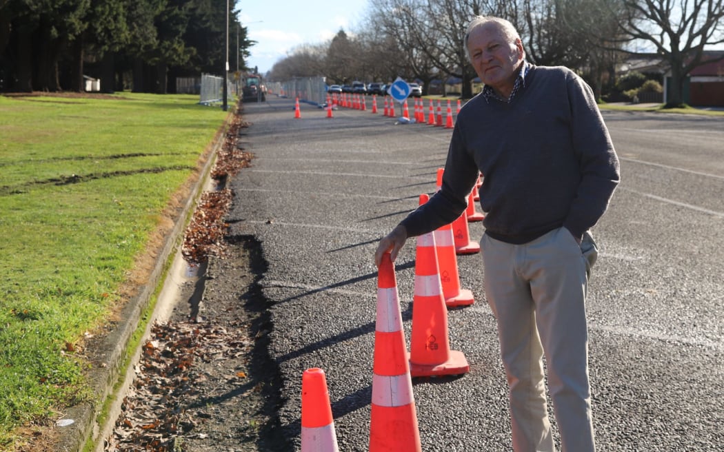 Ray Logan can't understand the "excessive use" of road cones along the kerb and channel project at the Ashburton Domain.
