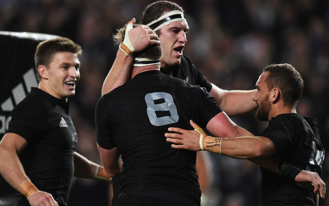 The All Blacks celebrate Kieran Read's try.