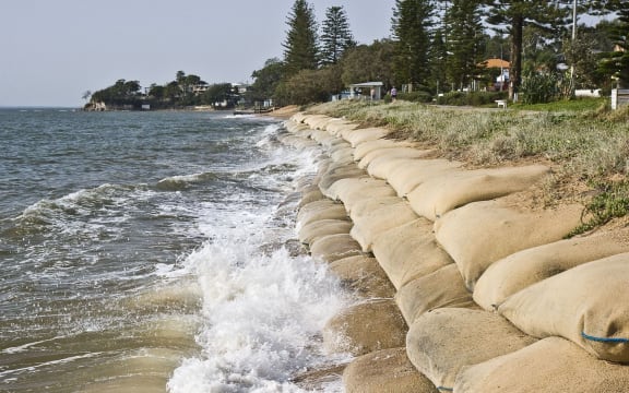 Erosion caused by rising sea levels due to global warming.