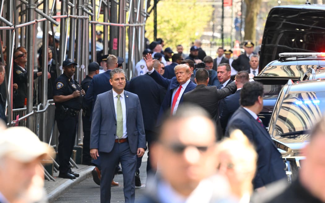 Former US president Donald Trump arrives ahead of his arraignment at the Manhattan Criminal Court in New York on April 4, 2023.