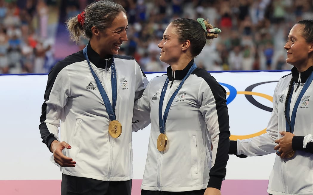 Sarah Hirini and Michaela Blyde on the podium. New Zealand v Canada, Rugby Sevens - Women's Gold Medal Match, Paris Olympic Games at the Stade de France in Paris, France, Thursday, July 30, 2024. Photo credit: Ian McGregor / www.photosport.nz