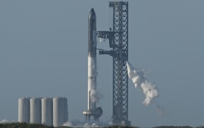 The SpaceX Starship rocket stands on the launchpad from the SpaceX Starbase in Boca Chica as seen from South Padre Island, Texas on 17 April, 2023.