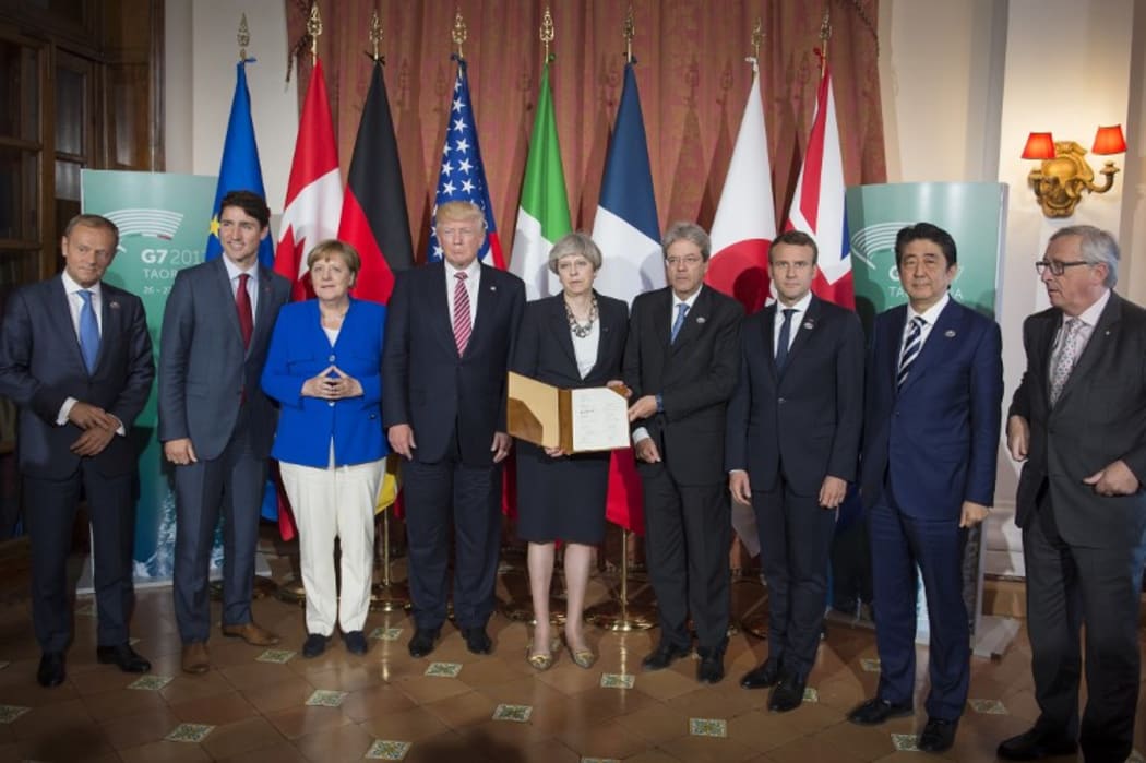 EU council President Donald Tusk  Canada PM Justin Trudeau, German chancellor Angela Merkel, US president Donald Trump, Great Britain PM Theresa May, Italy's PM Paolo Gentiloni, president of France Emmanuel Macron, Japan PM Shinzo Abe and president of the EU commission Jean-Claude Juncker.