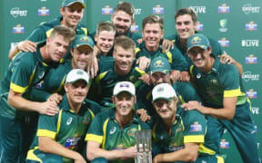 The Australia team celebrate a 4-1 ODI series win against South Africa at the Sydney Cricket Ground. 23 November 2014