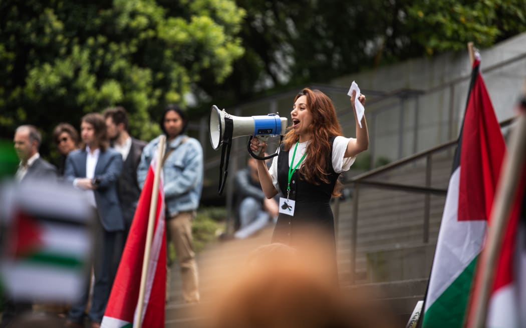 Hundreds of people gathered outside Parliament's steps to call on the government to demand an immediate and permanent ceasefire in Gaza on 5 December, 2023.
