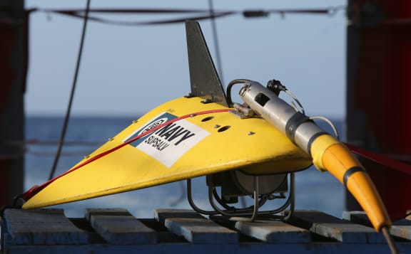 Australian navy ship HMAS Ocean Shield is using a "towed pinger locator" to search for the missing black box.