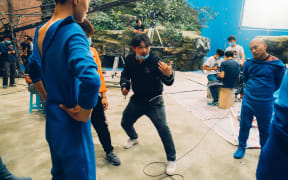 Willie Ying on set.