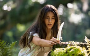 Daisy Edgar-Jones is Kya in the film adaptation of the novel Where the Crawdads Sing.