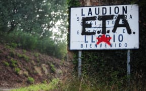 September 6, 2010 graffiti in favour of Basque armed group ETA covers a sign welcoming visitors to the Northern Spanish Basque village of Llodio. 
ETA announced it was fully disbanding in a letter on May 2, 2018.