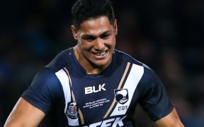 New Zealand's Roger Tuivasa-Sheck makes a break.