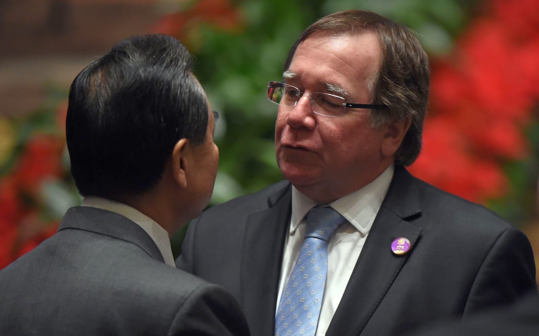 Murray McCully speaks to China's Foreign Minister Wang Yi at the Asia-Pacific Economic Cooperation (APEC) Summit Beijing, 7 November 2014.