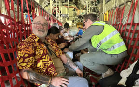 Andre Capiez and other Kiwis on New Caledonia evacuation flight