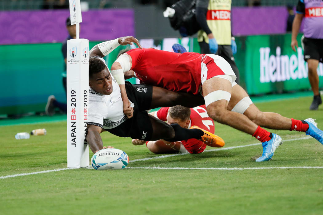 Josua Tuisova scores the opening try of the match.