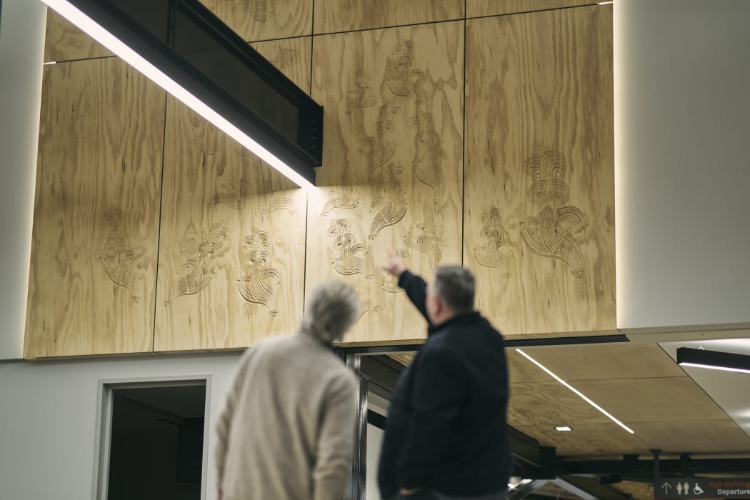 Architects Jacob Scott and Chris Ainsworth admire some of the new airport designs