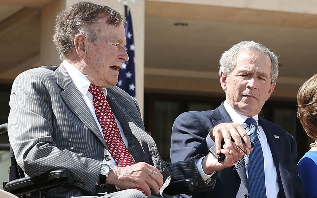 Former Presidents George HW Bush (left) and George W Bush in 2013.
