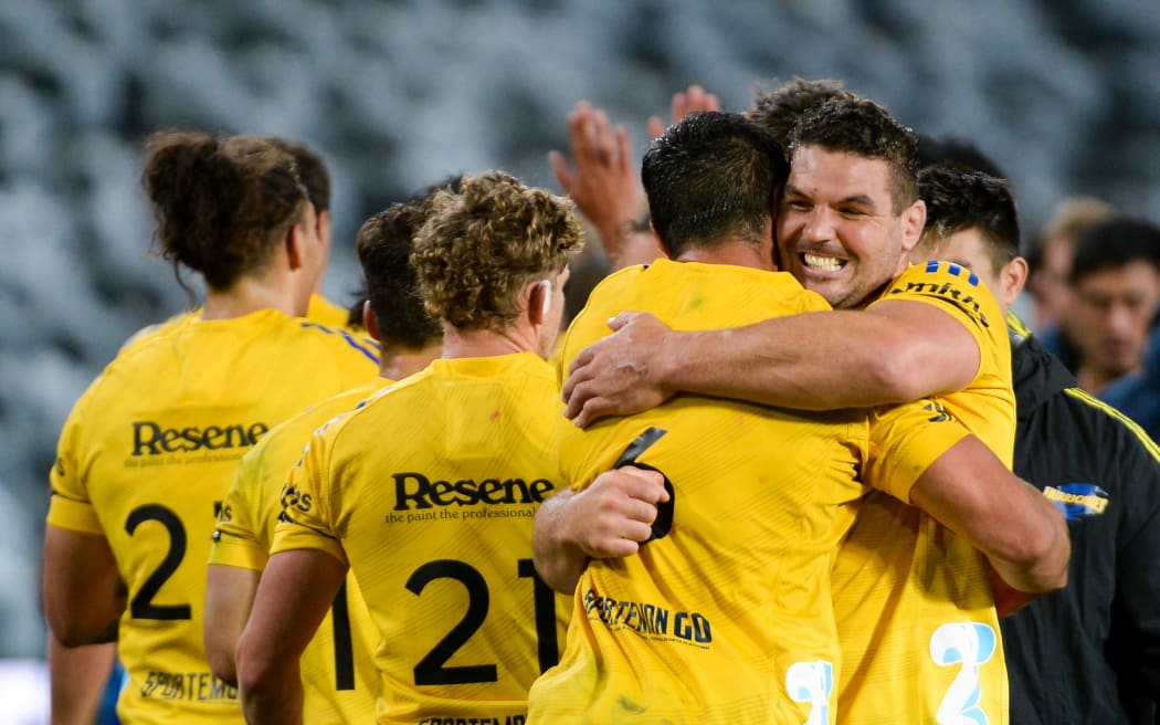 Hurricanes team celebrate the win.