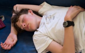 teenage boy sleeping