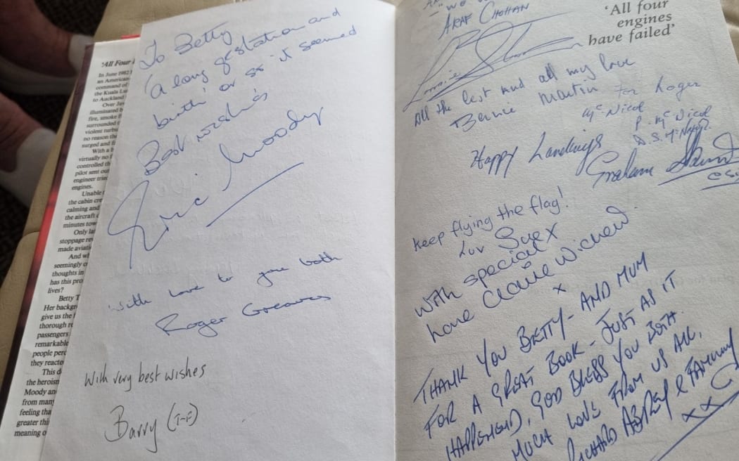 Fellow passengers signed Betty Ferguson's book.