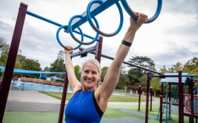 Personal trainer Kristina Wischnowsky demonstrating exercising in Christchurch's Hagley Park