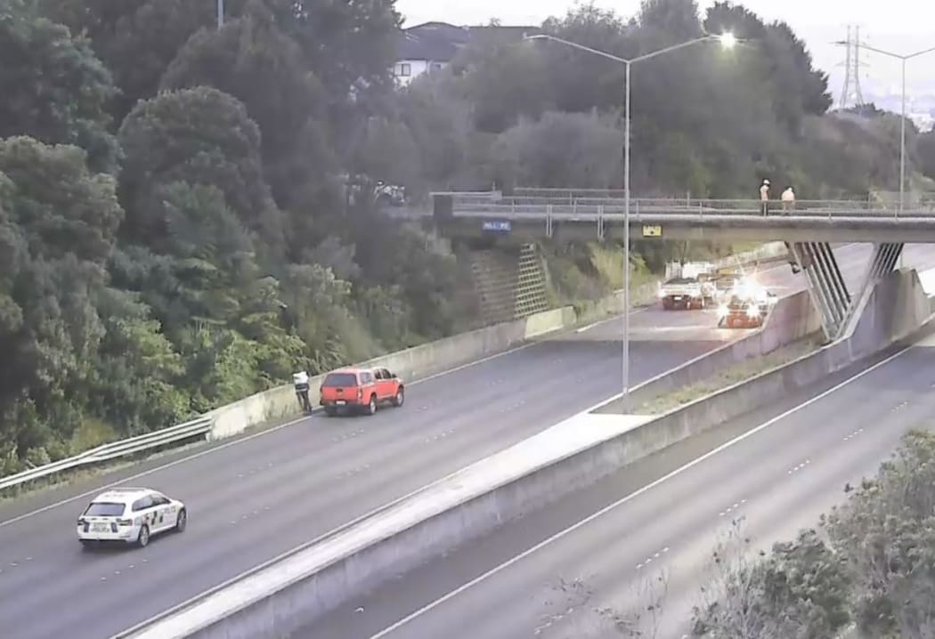The vehicle crashed through the overbridge barriers just before 4am, dropping to the motorway below
