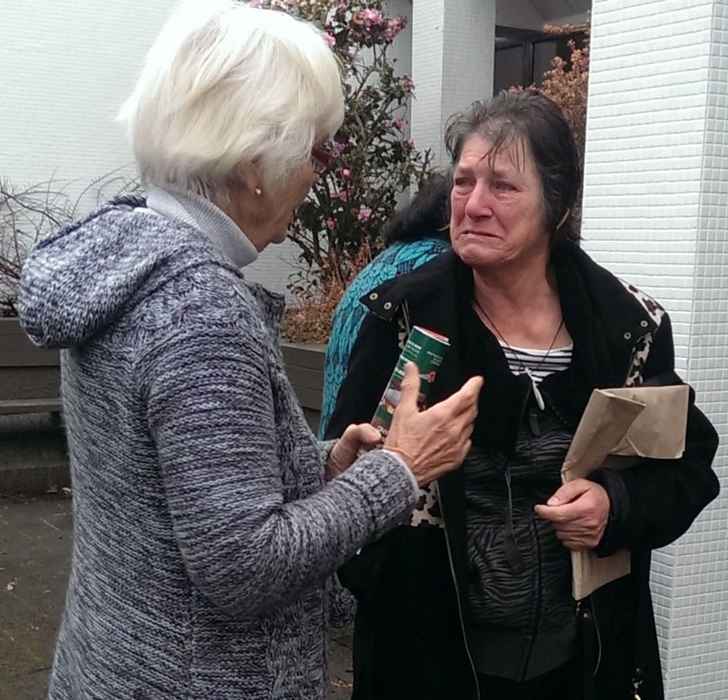 Supporters of Alan Barlow react to the guilty verdict outside the High Court at Rotorua.