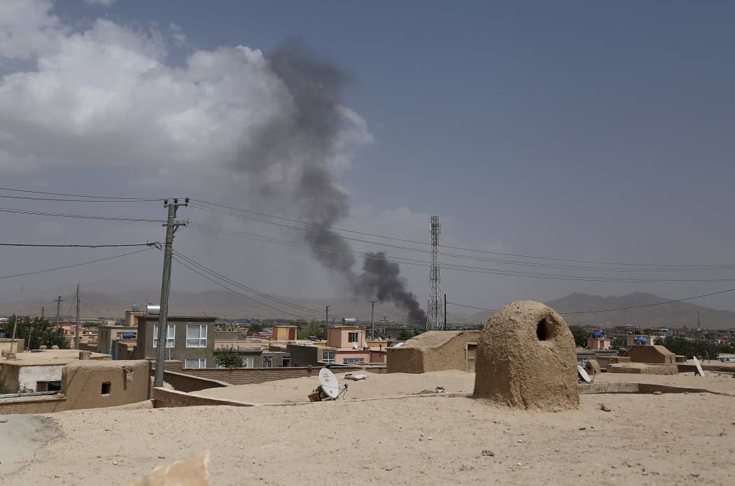 US forces launched airstrikes on August 10 to counter a major Taliban assault on an Afghan provincial capital, where terrified residents cowered in their homes amid explosions and gunfire as security forces fought to beat the insurgents back.