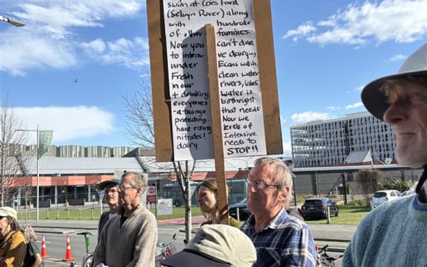 Protesters outside the Canterbury Regional Council offices demand action on nitrate levels.