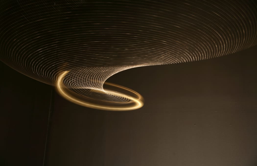A Sky Snake - made from 4.5 metres of ball chain - similar to the chain traditionally used for lamp or light switches - with a brass ball representing the head.