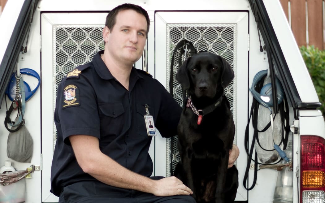 Detector dog Kane and his handler Senior Customs Officer Robert Gillanders.