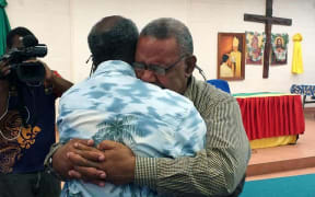 Former PNGDF Commander Jerry Singirok (right) embracing his former commanding officer Joe Pais after not seeing him for decades.