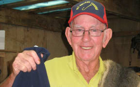 Colin Cox with his Possum Belt