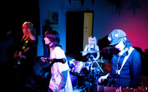 Dunedin's Queens High School band SEEK HELP.