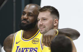 LeBron James (L) and Luka Doncic