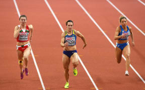 Belarus' Krystsina Tsimanouskaya (left) says she will not return to Belarus.