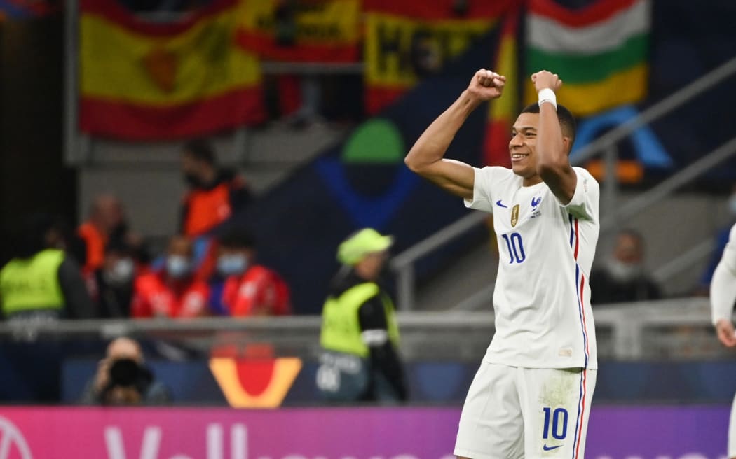 Kylian Mbappe (France) celebrates after scoring.