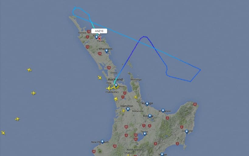 A screenshot from a flight-tracking website shows Flight NZ10's path.