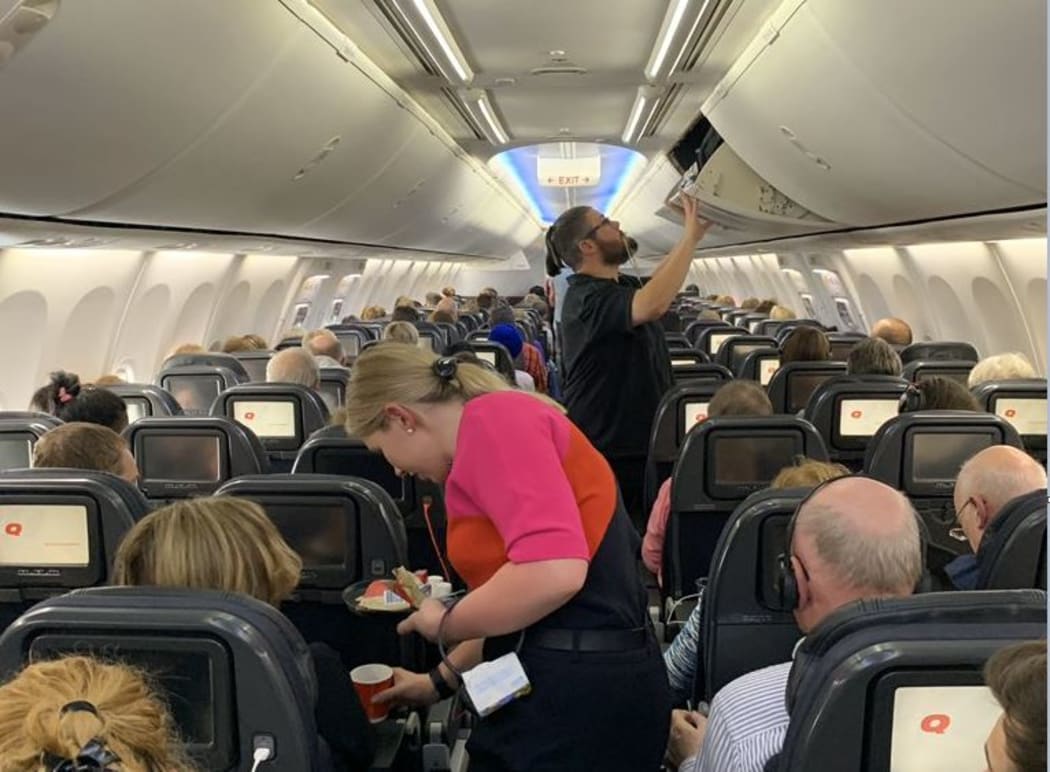 Passengers on the packed plane from Melbourne to Wellington included infants.