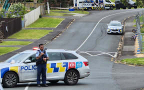 Police have cordoned off a large section of Beauchamp Drive in West Auckland's Massey on 18 December 2023 following the death of a man at Royal Reserve park overnight. Reverie Place has also been blocked off.