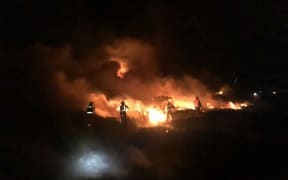 Firefighters tackled the scrub fire through the night.