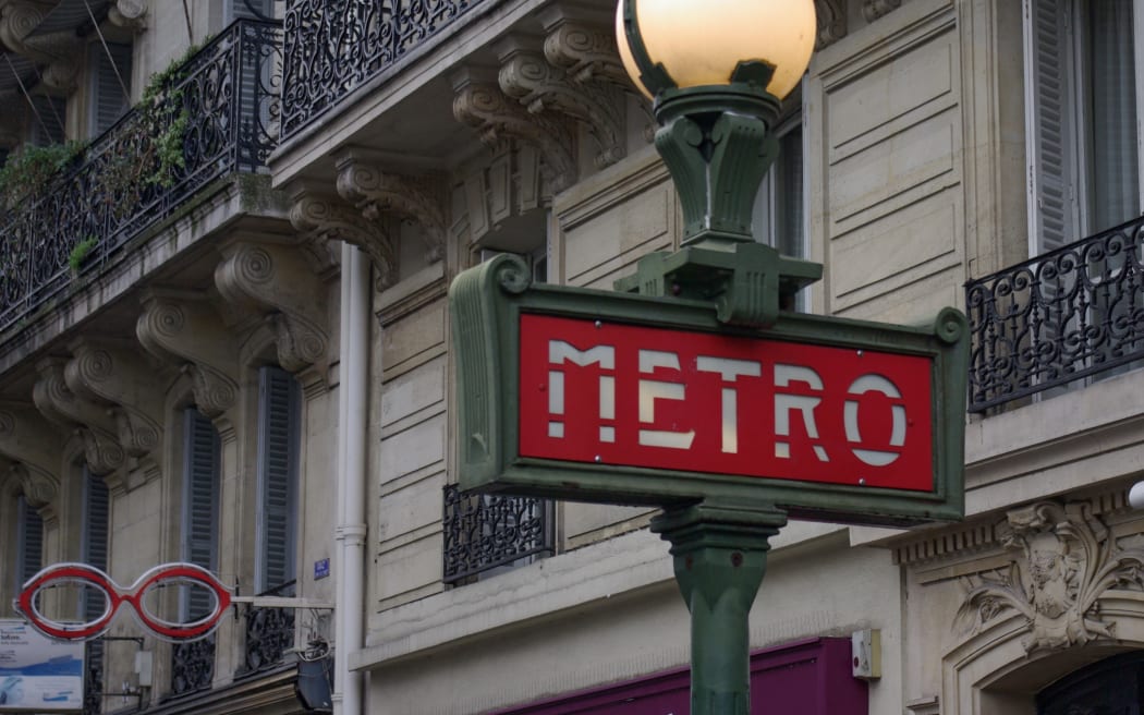 Close-up of a Paris Metro sign