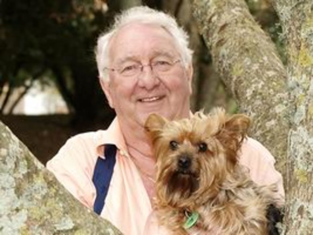 A headshot of SPCA Auckland executive director Bob Kerridge with his dog