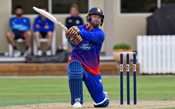 Colin Munroe playing for Auckland.