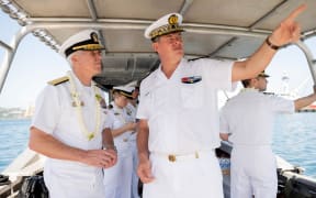 US Navy’s Seventh fleet commander, vice admiral  Karl Owen Thomas, left, and Commodore Geoffroy d’Andigné, commander of French Armed Forces in the Asia-Pacific, right, and French Polynesia, earlier this month in Tahiti.