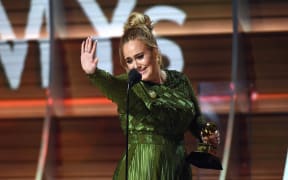 Adele accepts the award for Record of the Year for 'Hello,' onstage during The 59th GRAMMY Awards at STAPLES Center on 12 February, 2017 in Los Angeles, California.