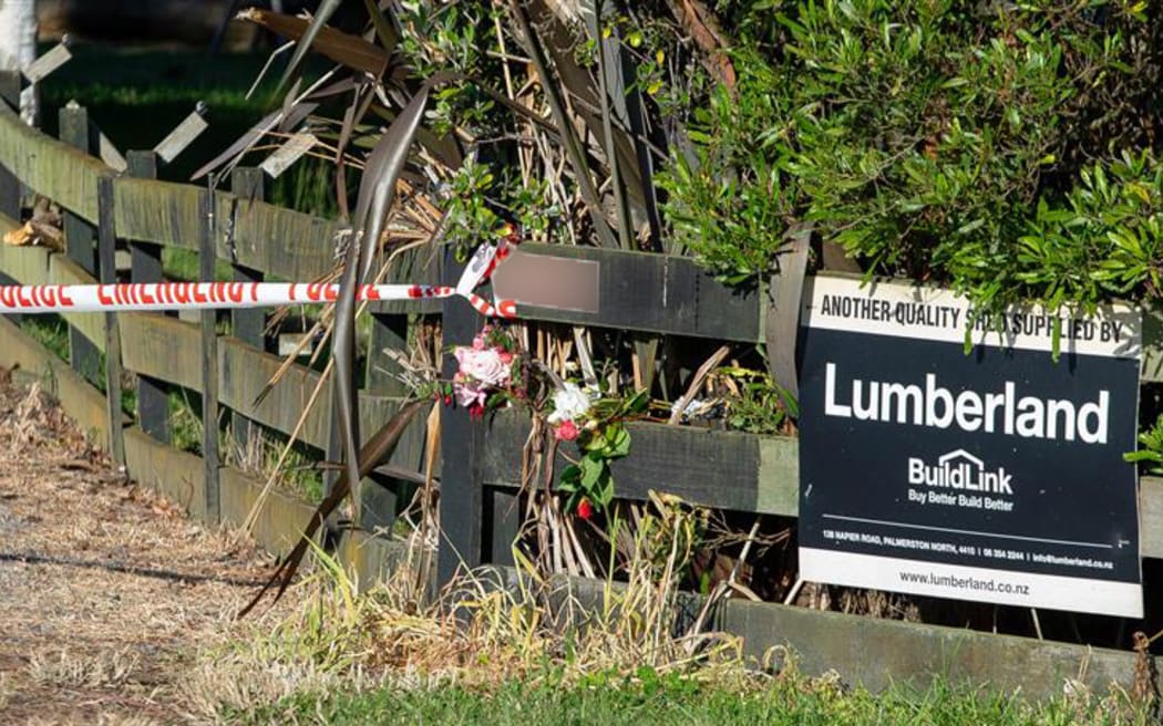 Outside the scene of a fatal house fire in Sanson, November 2025.