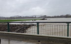 A flooded river near Te Karaka on 22 June 2023.