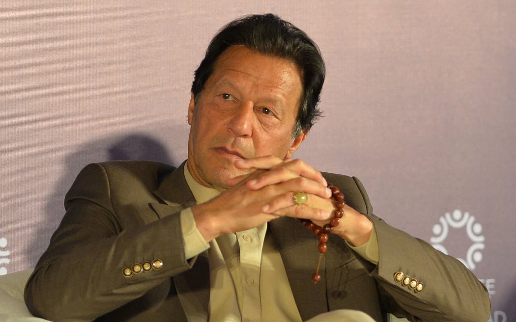 Pakistan's Prime Minister Imran Khan attends the Refugee Summit Islamabad to mark 40 years of hosting Afghan refugee in Islamabad on February 17, 2020. (Photo by Aamir QURESHI / AFP)