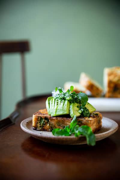 Cheesy herby cornbread with avocado