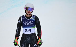 New Zealand's Alice Robinson reacts in the finish area after competing in the women's super-G event during the Milano Cortina 2026 Winter Olympic Games at the Tofane Alpine Skiing Centre in Cortina d’Ampezzo on February 12, 2026.