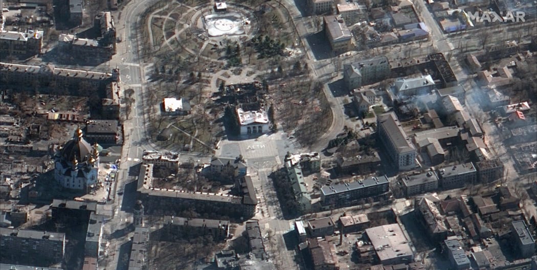 Rescuers in Ukraine searched on March 19, 2022 for hundreds of civilians feared trapped under the wreckage of a bombed theatre, as local forces battled against Russian troops across the country.